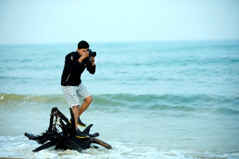 Dilip photographing a natural beachside scene