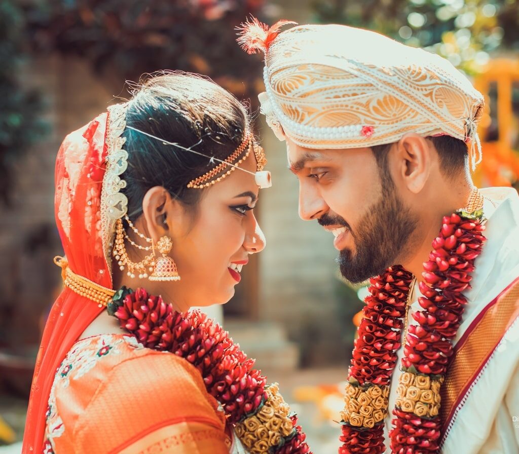 candid picture of bride and groom looking at each other