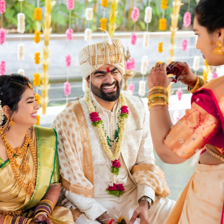 Bride and Groom sharing a joyful moment on their wedding day