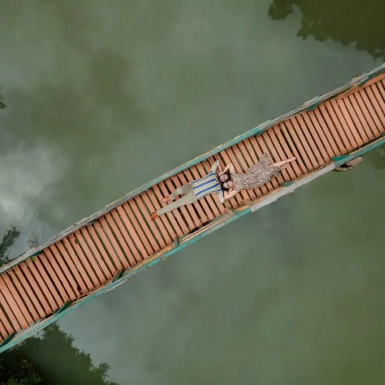 Couple enjoying a romantic pre-wedding drone shoot, capturing their special moments and love from stunning aerial angles